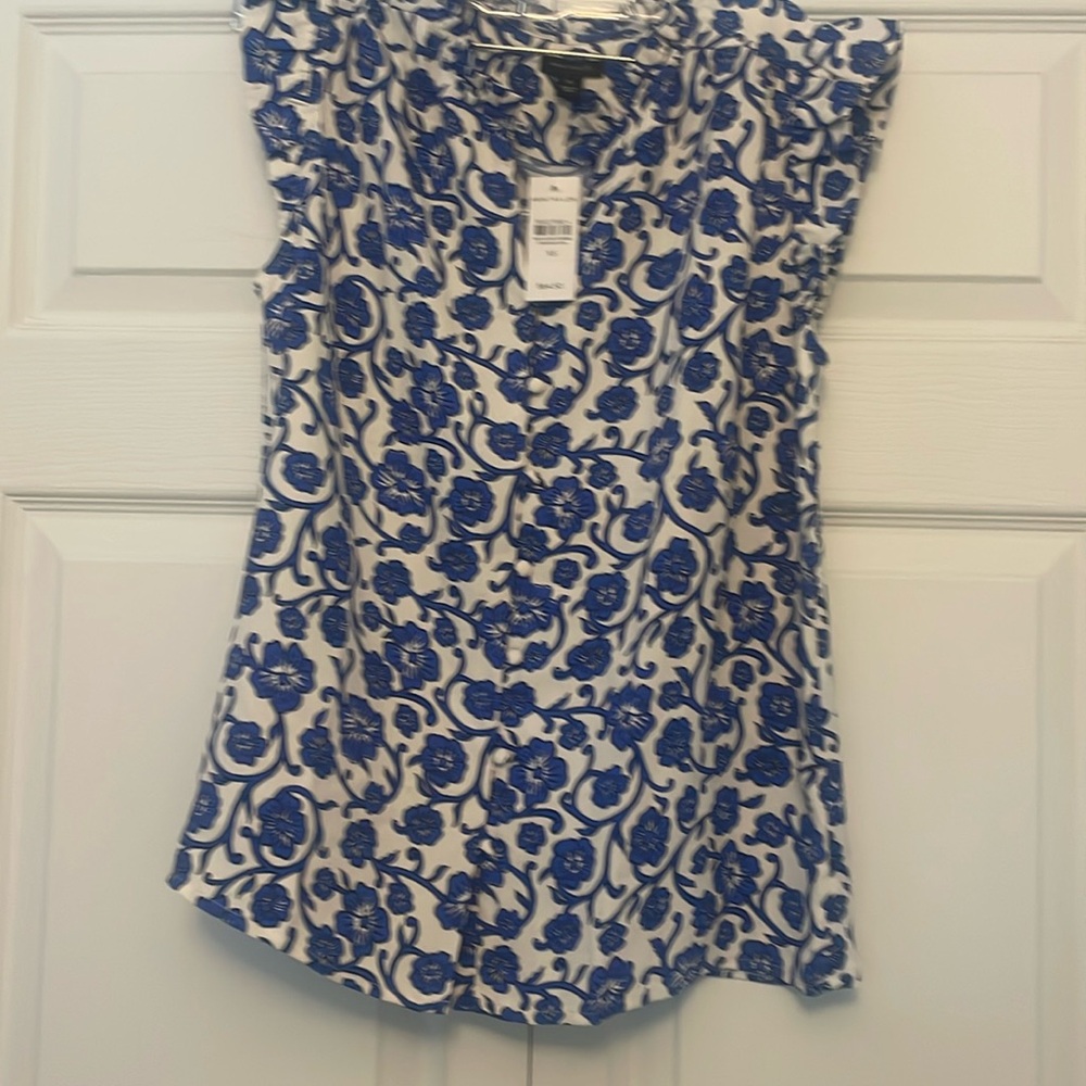 Ann Taylor blue floral blouse with ruffle detail. NWT. XS.